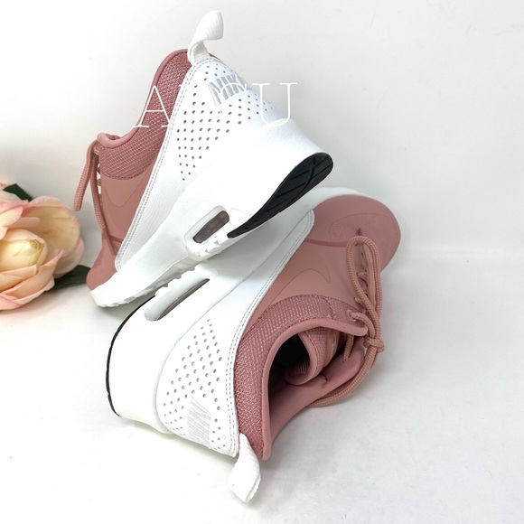 nike thea rust pink
